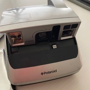 Polaroid with fresh roll of film